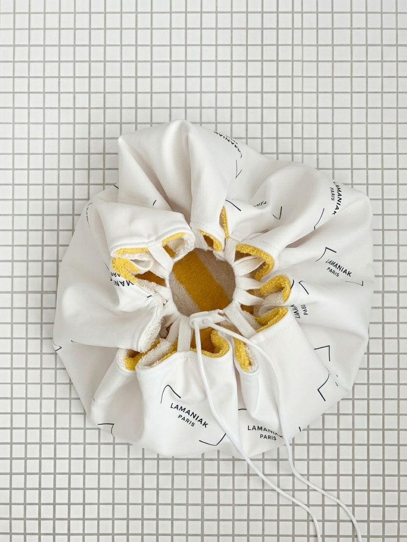 Le sac piscine étanche recto/verso coton jaune et blanc fait main à Paris