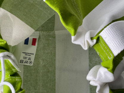 sac été tendance 2026 pour la plage en toile 100% coton rayé vert et blanc qui s'appelle LA ROCHELLE fait main à Paris par LAMANIAK