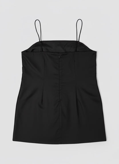 La robe noire à avoir avec ses fines bretelles et poches latérales par LAMANIAK à Paris
