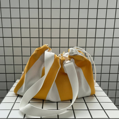 Sac en toile 100% coton rayé jaune et blanc s'appelle ST-TROPEZ fait main à Paris par LAMANIAK